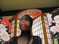 Asian girl nylon encased ball gagged